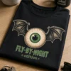 Majica z napisom FLY-BY-NIGHT x edition x in motivom očesa z netopirskimi krili v Halloween slogu