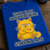 Majica z napisom Vsaka vlada obljubi spremembe / Stanje na TRR-ju in ilustracijo naveličane rumene mačke