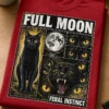 Majica z napisom FULL MOON FERAL INSTINCT in retro horror motivom črne mačke ter polne lune